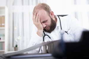 Depressed doctor over his wrong diagnosis.